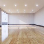 empty-room-interior-with-wooden-floor-wall-3d-rendering